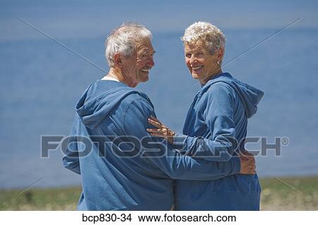 Picture - Couple at a beach, Washington State, USA. Fotosearch