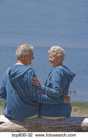 Couple at a beach, Washington State, USA View Large Photo Image Stock Image - Couple at a beach, Washington State, USA. Fotosearch