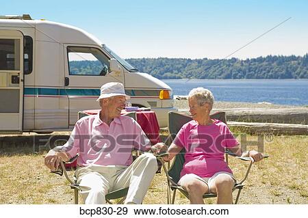 Couple at a beach, Washington State, USA View Large Photo Image Stock Photo - Couple at a beach, Washington State, USA. Fotosearch