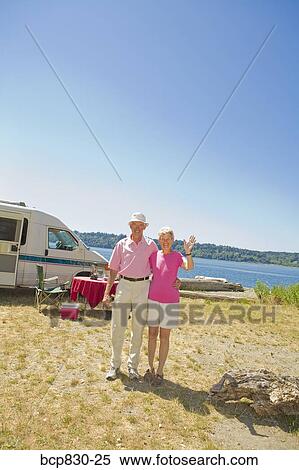 Couple at a beach, Washington State, USA View Large Photo Image Stock Photography - Couple at a beach, Washington State, USA. Fotosearch
