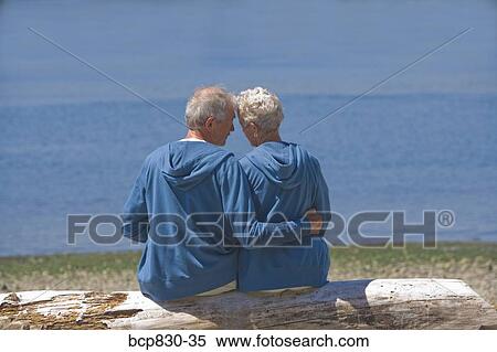 Stock Photography - Couple at a beach, Washington State, USA. Fotosearch