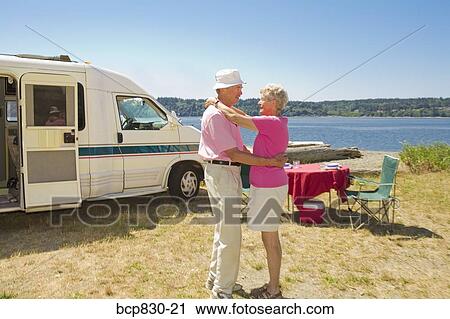 Couple dancing at a beach, Washington State, USA View Large Photo Image Stock Image - Couple dancing at a beach, Washington State, USA. Fotosearch