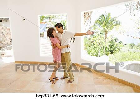 Stock Photography - Couple romancing and dancing. Fotosearch