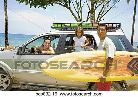Portrait of a family on vacation View Large Photo Image Stock Photo - Portrait of a family on vacation. Fotosearch
