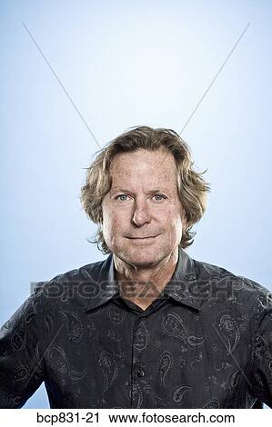 Portrait of a man smiling View Large Photo Image Stock Image - Portrait of a man smiling. Fotosearch