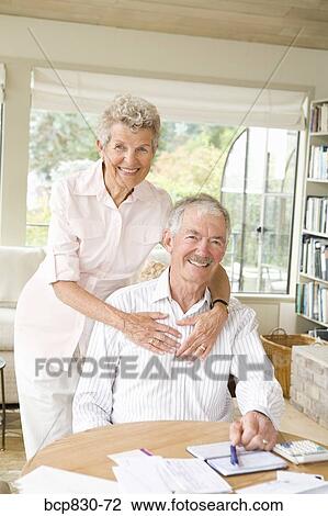 Portrait of a senior couple smiling View Large Photo Image Stock Image - Portrait of a senior couple smiling. Fotosearch