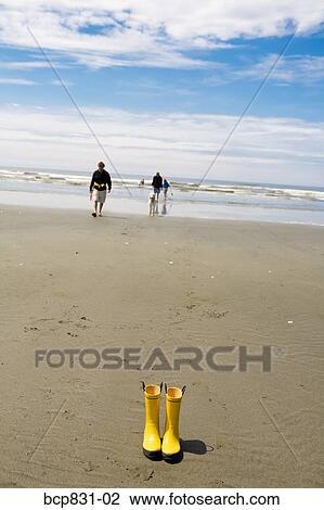 Rubber boots on the beach, Washington State, USA View Large Photo Image Stock Image - Rubber boots on the beach, Washington State, USA. Fotosearch