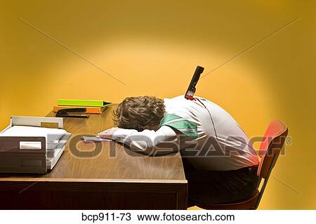 Stock Image - Deceased man in office stabbed in the back. Fotosearch