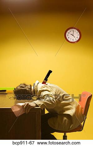 Stock Photo - Deceased woman in office stabbed in the back. Fotosearch