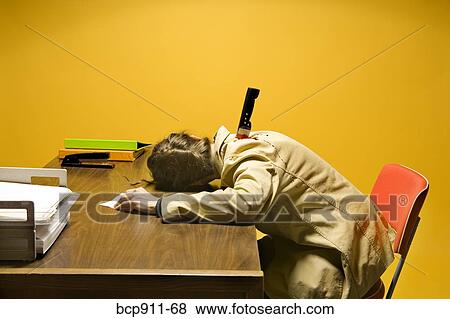 Stock Photo - Deceased woman in office stabbed in the back. Fotosearch
