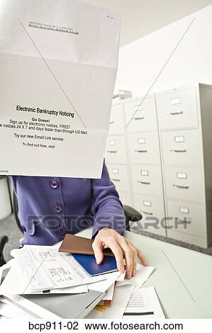 Distraught woman with bankruptcy notice View Large Photo Image Stock Image - Distraught woman with bankruptcy notice. Fotosearch