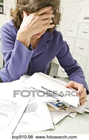 Distraught woman with bankruptcy notice View Large Photo Image Stock Photo - Distraught woman with bankruptcy notice. Fotosearch