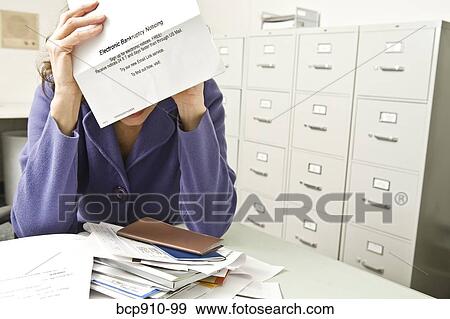 Distraught woman with bankruptcy notice View Large Photo Image Stock Photo - Distraught woman with bankruptcy notice. Fotosearch