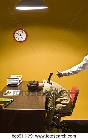 Stock Photo - Woman in office being stabbed in the back. Fotosearch