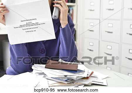 Woman on phone looking at bankruptcy notice View Large Photo Image Stock Photography - Woman on phone looking at bankruptcy notice. Fotosearch