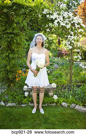 Stock Photo - Bride in garden. Fotosearch