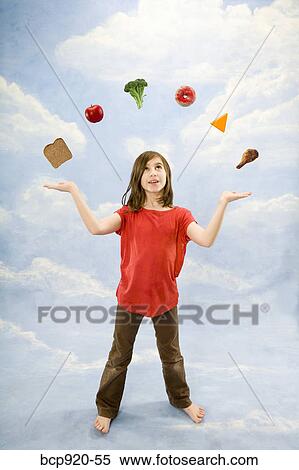 Child juggling different foods View Large Photo Image Stock Photography - Child juggling different foods. Fotosearch