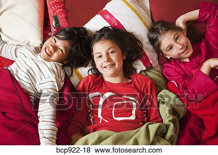 Stock Photo - Children at sleepover. Fotosearch