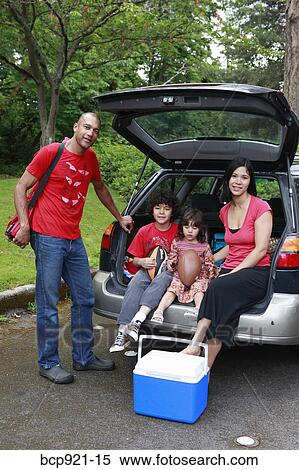 Family getting picnic items out of car View Large Photo Image Stock Photography - Family getting picnic items out of car. Fotosearch