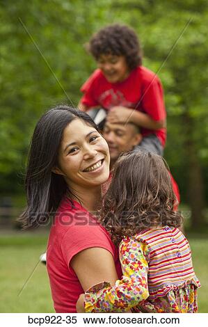 Stock Photography - Family in park. Fotosearch