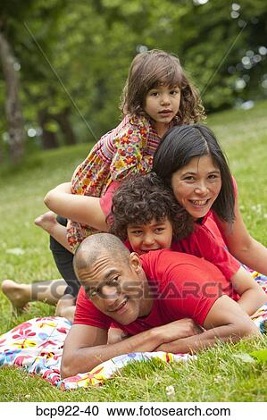 Family portrait outdoors View Large Photo Image Stock Image - Family portrait outdoors. Fotosearch