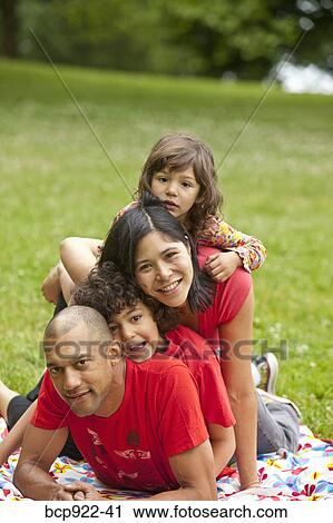 Stock Image - Family portrait outdoors. Fotosearch