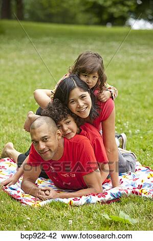 Stock Image - Family portrait outdoors. Fotosearch