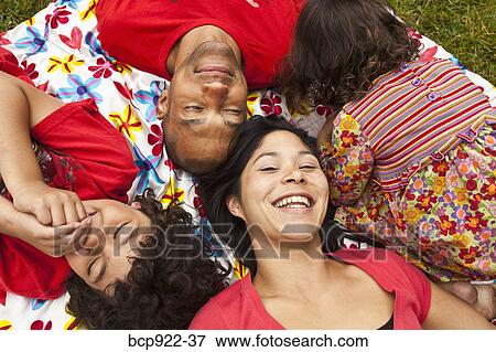 Family portrait outdoors View Large Photo Image Stock Photo - Family portrait outdoors. Fotosearch