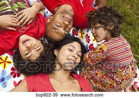 Stock Photo - Family portrait outdoors. Fotosearch