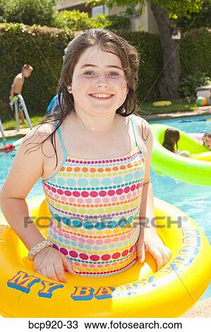 Girl in pool View Large Photo Image Stock Image - Girl in pool. Fotosearch