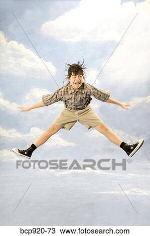 Girl jumping in air View Large Photo Image Stock Image - Girl jumping in air. Fotosearch