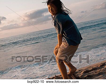 Girl on beach View Large Photo Image Stock Image - Girl on beach. Fotosearch