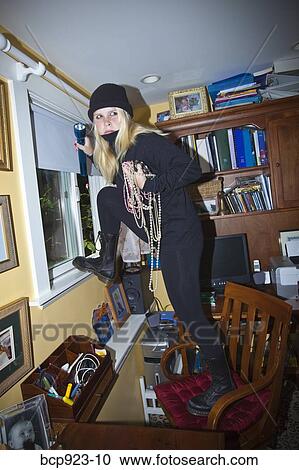 Teen girl dressed as cat burgler View Large Photo Image Stock Image - Teen girl dressed as cat burgler. Fotosearch
