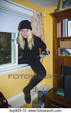 Teen girl dressed as cat burgler View Large Photo Image Stock Photography - Teen girl dressed as cat burgler. Fotosearch