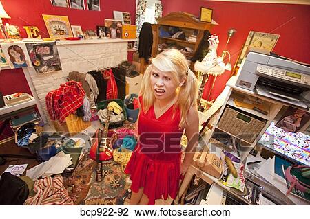 Teen girl in messy room View Large Photo Image Stock Image - Teen girl in messy room. Fotosearch