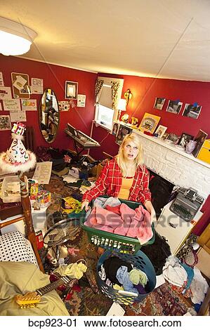 Teen girl in messy room View Large Photo Image Stock Image - Teen girl in messy room. Fotosearch