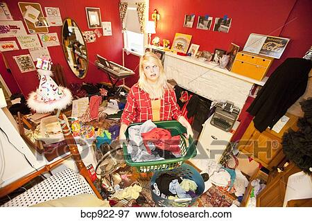 Teen girl in messy room View Large Photo Image Stock Photo - Teen girl in messy room. Fotosearch