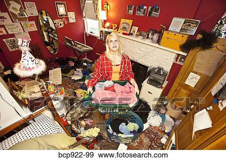 Teen girl in messy room View Large Photo Image Stock Photo - Teen girl in messy room. Fotosearch