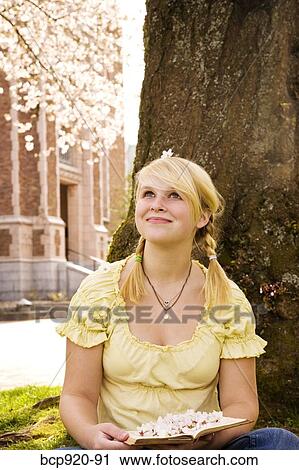 Teen girl on college campus View Large Photo Image Stock Image - Teen girl on college campus. Fotosearch
