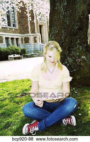 Teen girl on college campus View Large Photo Image Stock Photo - Teen girl on college campus. Fotosearch