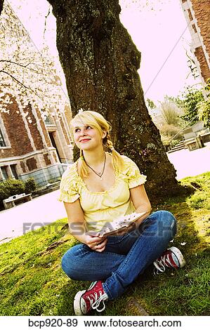 Teen girl on college campus View Large Photo Image Stock Photo - Teen girl on college campus. Fotosearch