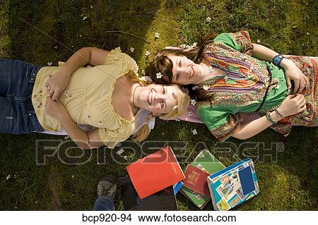 Teen girls on college campus View Large Photo Image Picture - Teen girls on college campus. Fotosearch