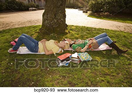 Teen girls on college campus View Large Photo Image Stock Image - Teen girls on college campus. Fotosearch