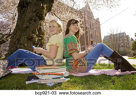 Teen girls on college campus View Large Photo Image Stock Image - Teen girls on college campus. Fotosearch