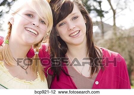 Teen girls on college campus View Large Photo Image Stock Image - Teen girls on college campus. Fotosearch