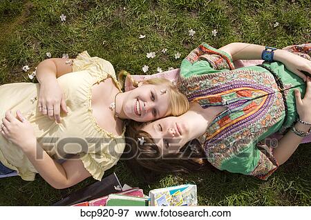 Teen girls on college campus View Large Photo Image Stock Photo - Teen girls on college campus. Fotosearch