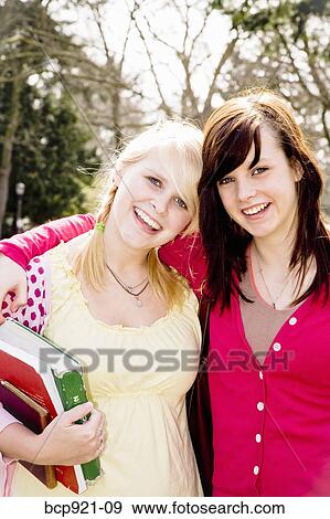 Teen girls on college campus View Large Photo Image Stock Photo - Teen girls on college campus. Fotosearch