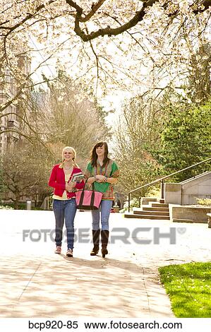 Teen girls on college campus View Large Photo Image Stock Photography - Teen girls on college campus. Fotosearch