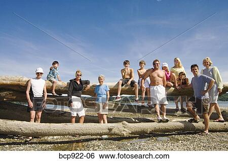 Three generations of family on beach View Large Photo Image Stock Photograph - Three generations of family on beach. Fotosearch