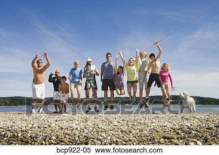 Three generations of family on beach View Large Photo Image Stock Photography - Three generations of family on beach. Fotosearch